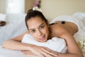 Young beautiful Asian woman relaxing in the spa massage Royalty Free Stock Photo