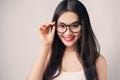 Young beautiful Asian woman with smiley face wearing glasses. Royalty Free Stock Photo