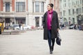 Young beautiful asian woman in stylish gray coat