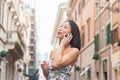 Young beautiful asian woman using mobile phone urban outdoor Royalty Free Stock Photo