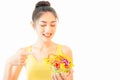 Young beautiful asian woman wore yellow undershirt, Holding a salad glass cup isolated on white background dummbell Royalty Free Stock Photo