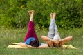 Young beautiful athletic mature couple does gymnastics