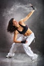 Young beautiful athletic woman dancing modern dance hip-hop Royalty Free Stock Photo