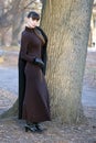 Young beautiful attractive woman in dress standing