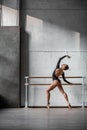 Young beautiful ballerina posing in studio Royalty Free Stock Photo