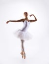 Young beautiful ballet dancer on a white background Royalty Free Stock Photo