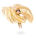 Young beautiful belly dancer in a gold costume Royalty Free Stock Photo