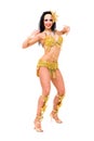 Young beautiful belly dancer in a gold costume Royalty Free Stock Photo