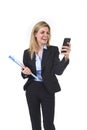 Young beautiful blond hair businesswoman using internet app on mobile phone holding office folder and pen smiling happy Royalty Free Stock Photo