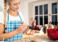 Woman baking in the kitchen christmas Royalty Free Stock Photo