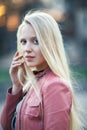 Young beautiful blond woman portrait with wind in her hair Royalty Free Stock Photo