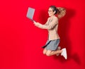 Young beautiful blonde businesswoman wearing elegant clothes and glasses smiling happy Royalty Free Stock Photo