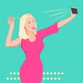 Young beautiful blonde gir in a pink dress taking a selfie with a mobile phone