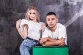 Young beautiful blonde girl posing with her boyfriend Royalty Free Stock Photo