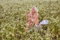 Young beautiful sexy naked woman in the summer morning field Royalty Free Stock Photo