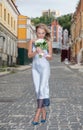 Young beautiful blonde with a wedding bouquet Royalty Free Stock Photo