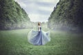 Young beautiful blonde woman in blue dress Royalty Free Stock Photo