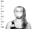 Young beautiful blonde woman chewing gum and blowing bubbles Criminal Mug Shots