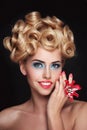 Young beautiful blonde woman with fancy makeup and prom hairdo Royalty Free Stock Photo