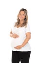 Young beautiful blonde woman pregnant expecting baby over isolated white background with a happy and cool smile on face Royalty Free Stock Photo