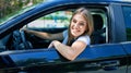 Young beautiful blonde woman smiling happy driving car Royalty Free Stock Photo