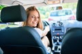 Young beautiful blonde woman smiling happy driving car Royalty Free Stock Photo