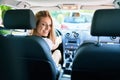 Young beautiful blonde woman smiling happy driving car Royalty Free Stock Photo