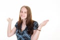 Young beautiful blonde woman smiling surprised with both hands up disillusioned Royalty Free Stock Photo