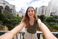 Young beautiful Brazilian woman with stylish wears takes self portrait in Sao Paulo, Brazil