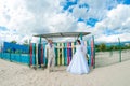 Young and beautiful bride and groom on the beach Royalty Free Stock Photo