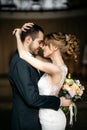 Young and beautiful bride and groom embrace Royalty Free Stock Photo