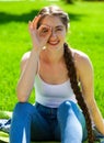 Young beautiful brunette girl in white shirt posing on spring park Royalty Free Stock Photo