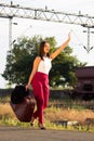 Young beautiful brunette lady teenager waiting a train Royalty Free Stock Photo