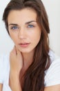 Young beautiful brunette. A naturally beautiful young woman looking at you. Royalty Free Stock Photo