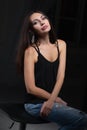 Young beautiful brunette posing in studio Royalty Free Stock Photo