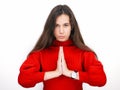 Young beautiful brunette woman in red sweater thinking looking to the side at blank copy space, isolated over white background Royalty Free Stock Photo