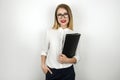 Young beautiful business woman in eyeglasses holding black folder with documents isolated white background Royalty Free Stock Photo