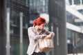 Young beautiful business woman holding purse Royalty Free Stock Photo