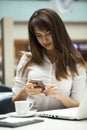 Young beautiful business woman reading messages Royalty Free Stock Photo