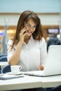 Young beautiful business woman reading messages Royalty Free Stock Photo