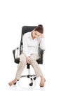 Young beautiful business woman sitting on a chair. Royalty Free Stock Photo