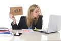 Young beautiful business woman suffering stress working at office asking for help feeling tired Royalty Free Stock Photo