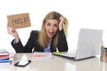 Young beautiful business woman suffering stress working at office asking for help feeling tired Royalty Free Stock Photo