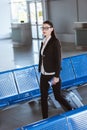 young beautiful businesswoman in glasses walking with baggage Royalty Free Stock Photo