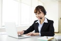 Young beautiful businesswoman with headset Royalty Free Stock Photo