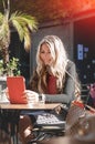 Young and beautiful businesswoman using her digital tablet in ca Royalty Free Stock Photo