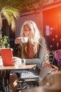 Young and beautiful businesswoman using her digital tablet in ca Royalty Free Stock Photo