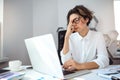 Young beautiful businesswoman working with laptop at workplace in office. Royalty Free Stock Photo