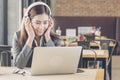 Young beautiful call center agent with headset and laptop communicate with customer client. support call center helpline with Royalty Free Stock Photo