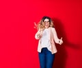 Young beautiful caucasian businesswoman wearing jacket and glasses smiling happy Royalty Free Stock Photo
